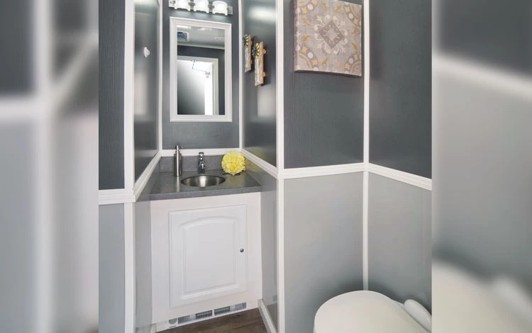 Clean portable toilets set up by DFW Toilets for an outdoor event in Fort Worth