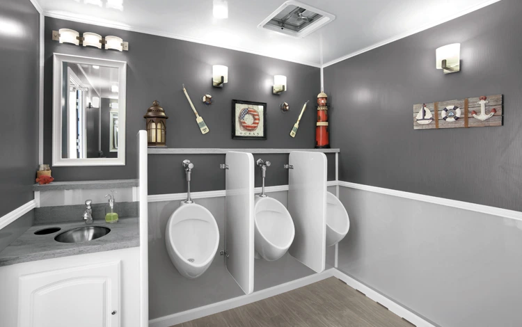 Portable bathroom rental setup by DFW Toilets at outdoor event in Fort Worth